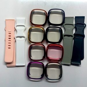 Fitbit Versa 3 pink , white , black, and grey bands and 8 watch face protectors